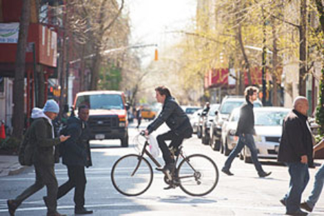 a man riding hiding his bike